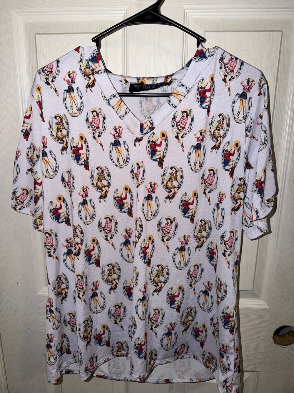 Lucky & Blessed White V-Neck Tee with Retro Pin-Up Motifs